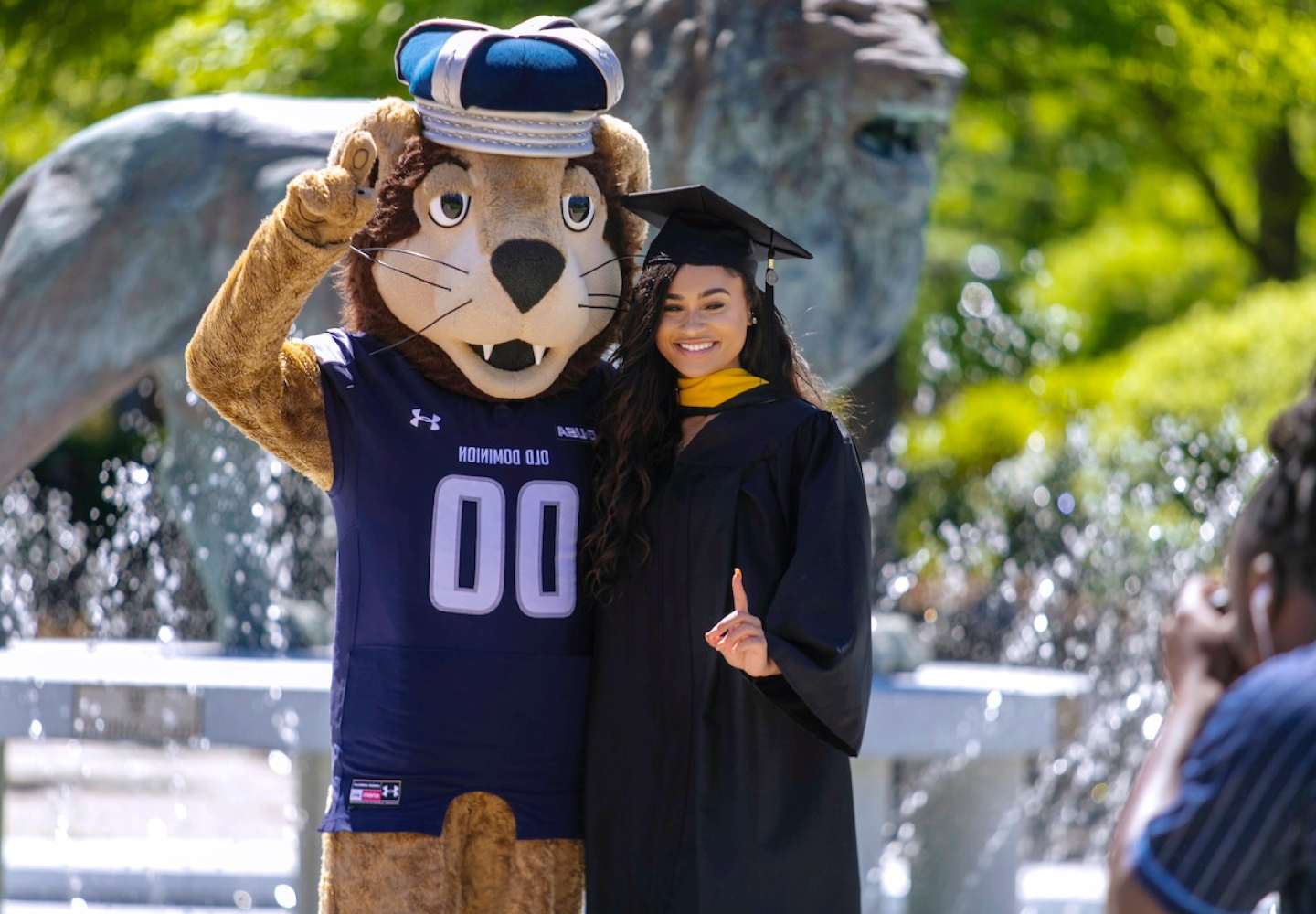 ODU Grad with Big Blue Mascot